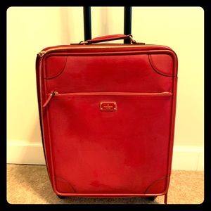 Kate Spade red Luggage.